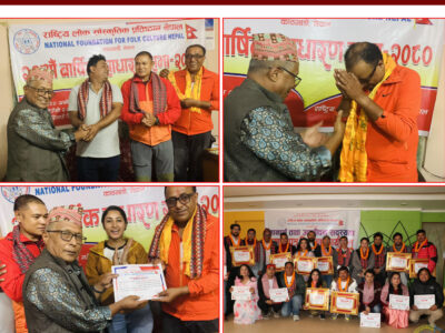 Singer Namraj Dhunjana after being elected and receiving a certificate at the 23rd Annual General Meeting of the National Institute of Folk Culture